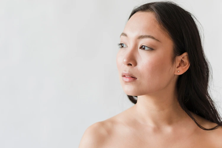 Lady with beautiful and full cheeks posing for a photo shoot.